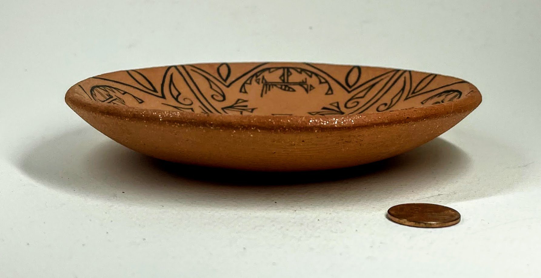 Zuni Spirits is proud to represent a variety of Zuni fetish carvers, including Kent Banteah, Potter, Zuni!