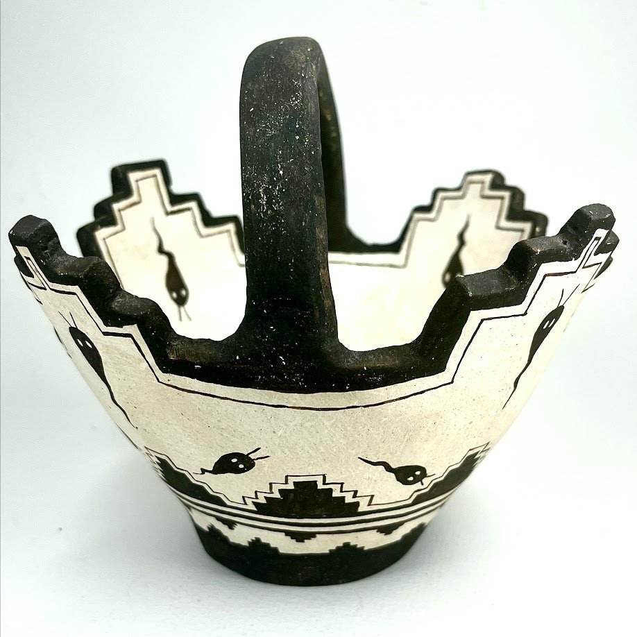 Zuni Spirits is proud to represent a variety of Zuni fetish carvers, including Josephine Nahohai, (1912 - 2007), Potter, Zuni!