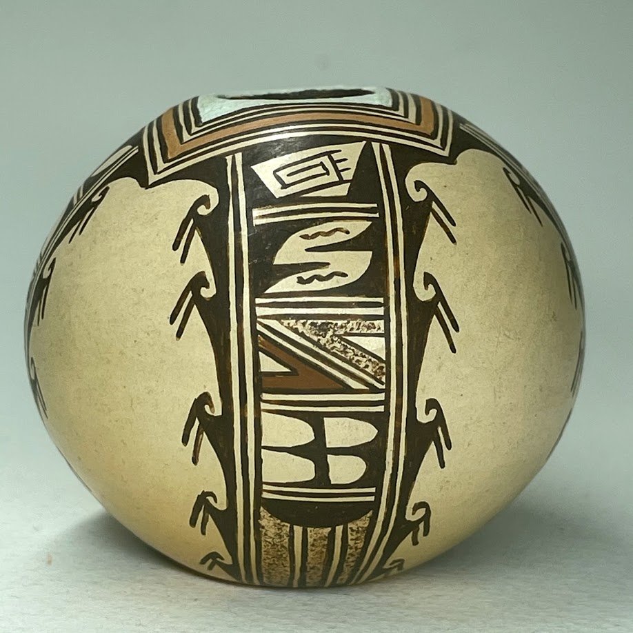 Zuni Spirits is proud to represent a variety of Zuni fetish carvers, including Cynthia R. Sequie Komalestewa, Hopi, (1955-1995), Potter, Hopi!