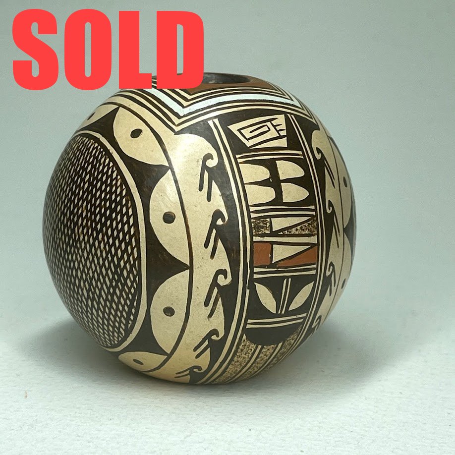 Cynthia R. Seque Komalestewa (d.), Hopi | Clay & natural pigments | Seed pot |
Price: $150.  +   shipping, depending on your location | Texas sales tax applies to Texas Residents! | 
CLICK  IMAGE for more views & information. | Authentic Zuni fetishes direct from Zuni Pueblo to YOU 
from Zunispirits.com!